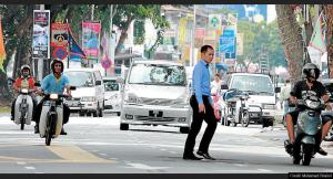 Maylasia Penang pred crossing in traffic Pulau Tikus